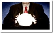 Businessman Consulting Glowing Crystal Ball