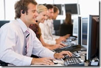 Stock Traders Working At Computers