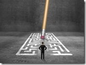 man looking at maze