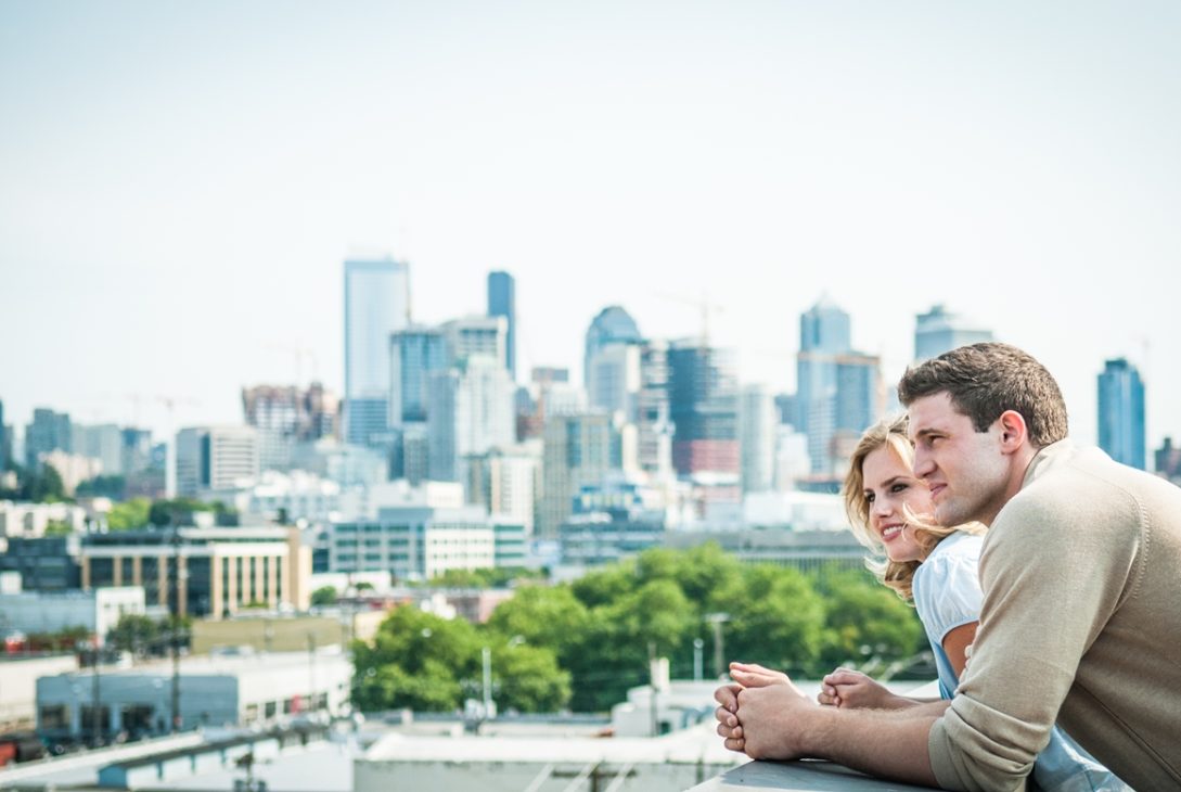 Young couple sitting on the sidelines to buy a home