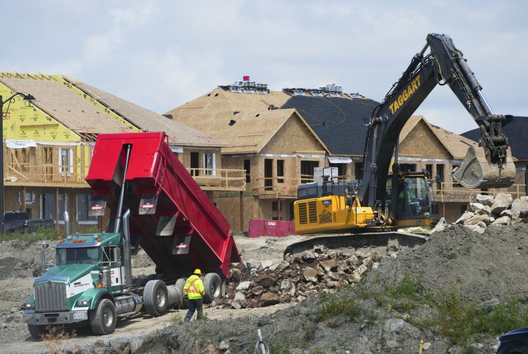 The Canada Mortgage and Housing Corp. says construction of new homes in Canada's six largest cities remained stable at near all-time high levels last year, driven by a surge of new apartment starts despite demand still outpacing supply for rental housing. New homes are built in Ottawa on Monday, Aug. 14, 2023. THE CANADIAN PRESS/Sean Kilpatrick The Canada Mortgage and Housing Corp. says construction of new homes in Canada's six largest cities remained stable at near all-time high levels last year, driven by a surge of new apartment starts despite demand still outpacing supply for rental housing. New homes are built in Ottawa on Monday, Aug. 14, 2023. THE CANADIAN PRESS/Sean Kilpatrick