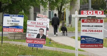 Experts say title and mortgage fraud are fast growing in Canada and homeowners should take steps to protect their properties — and their identities. A person walks past multiple for-sale and sold real estate signs in Mississauga, Ont., on Wednesday, May 24, 2023. THE CANADIAN PRESS/Nathan Denette Experts say title and mortgage fraud are fast growing in Canada and homeowners should take steps to protect their properties — and their identities. A person walks past multiple for-sale and sold real estate signs in Mississauga, Ont., on Wednesday, May 24, 2023. THE CANADIAN PRESS/Nathan Denette