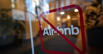 A sign indicating Airbnb rentals are not permitted