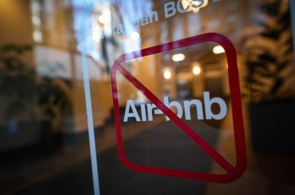 A sign indicating Airbnb rentals are not permitted